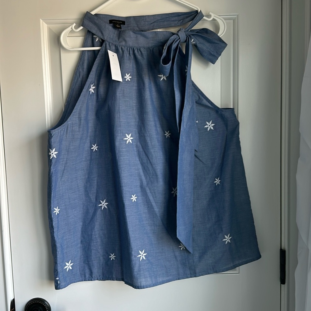 NWT cute and classic Ann Taylor Factory lightweight blue sleeveless tie top.